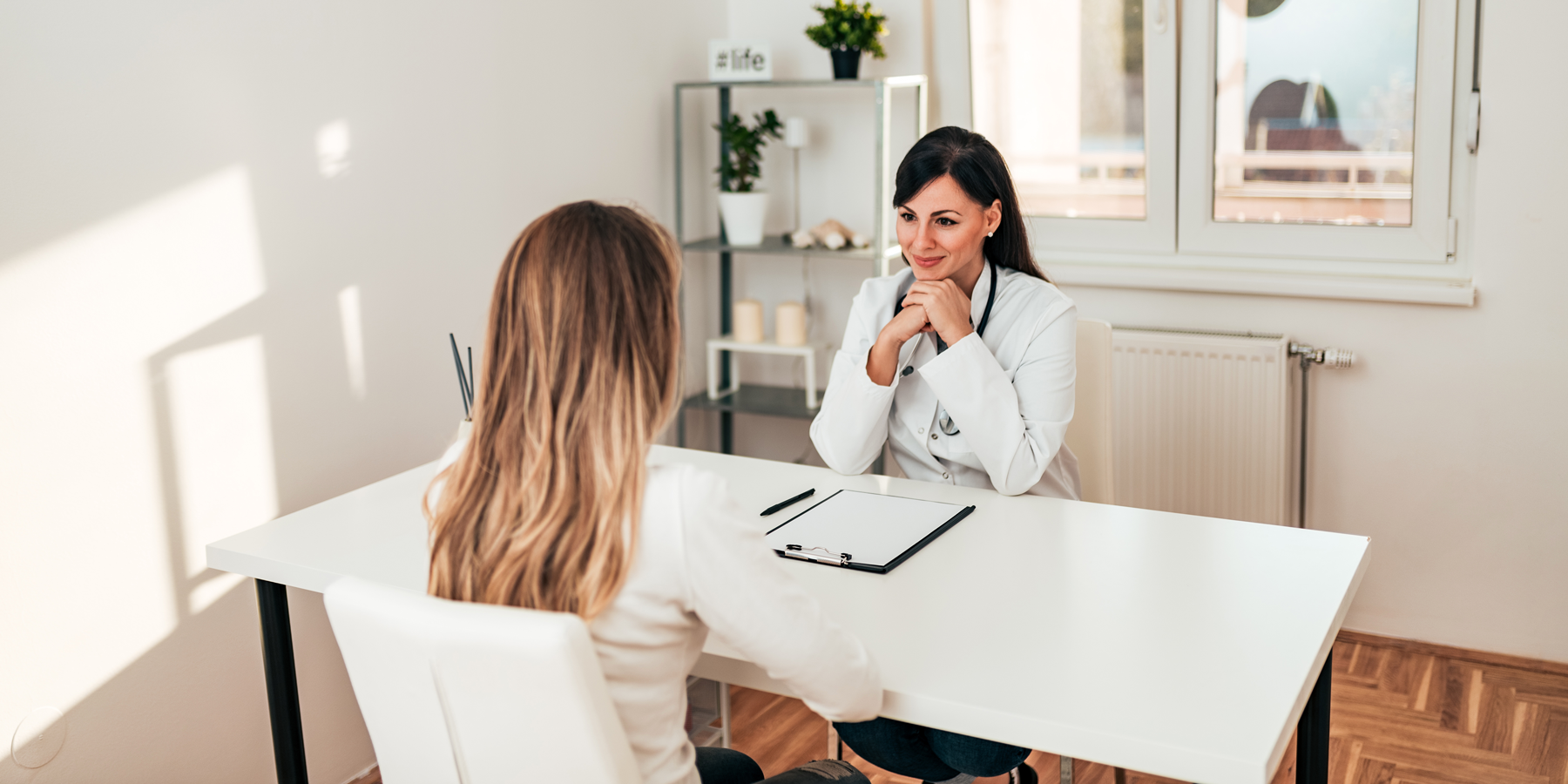  Female Doctor And Patient 